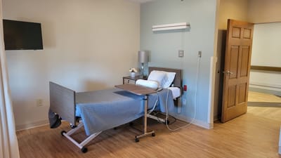 Private resident room with a bed and furnishings