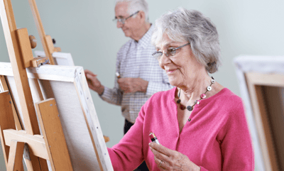 Residents participating in an art activity.