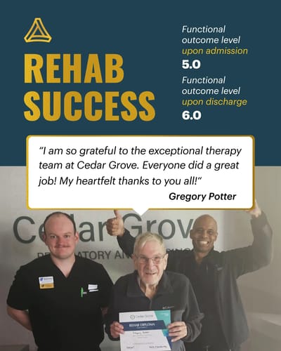 Therapist and resident celebrating rehab success