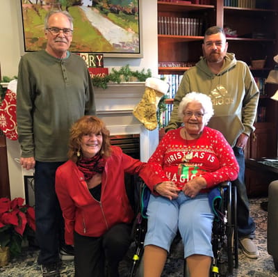 Family gathering in decorated common area