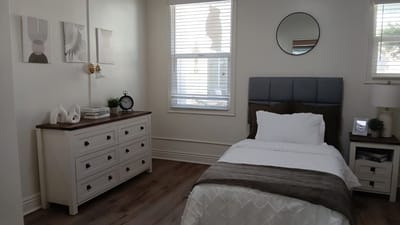 Bright, cozy private resident room with modern decor