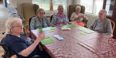Residents engaging in a Bingo game activity