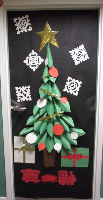 Holiday-themed door decoration with paper crafts.