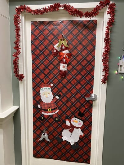 Decorated door with holiday theme