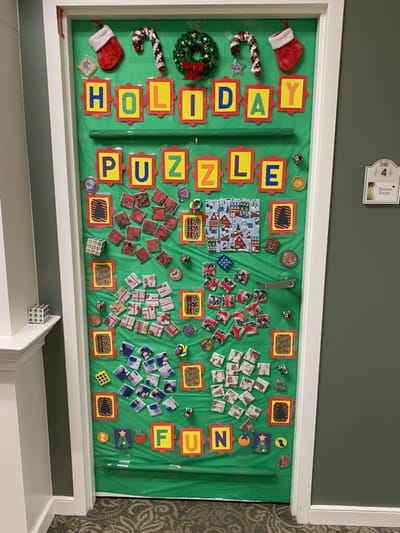 Festive holiday-themed puzzle door decoration