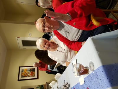 Residents enjoying companionship during a gathering.