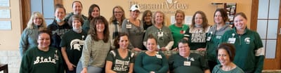 Staff members gathered in a common area at Pleasant View