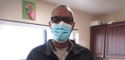 Resident wearing a mask indoors