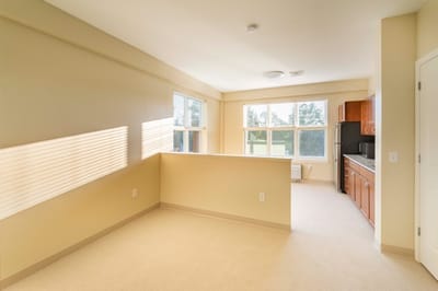 Bright interior of a resident room with windows