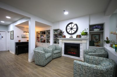Common area with seating and a fireplace