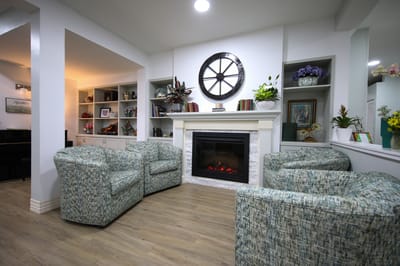 Interior common area with seating and fireplace