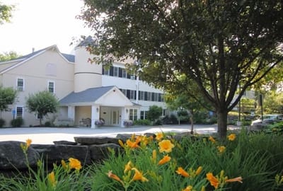 Exterior view of Spring Village at Summerhill and garden