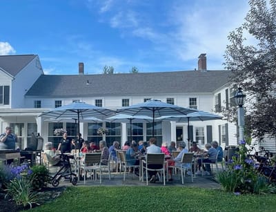 Residents enjoying an outdoor gathering on the patio