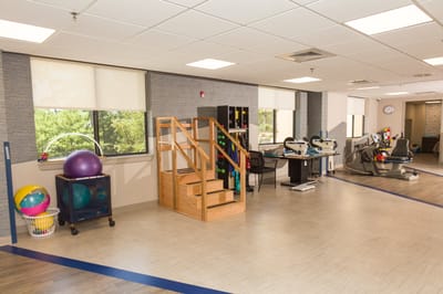 Interior view of a rehabilitation gym with equipment
