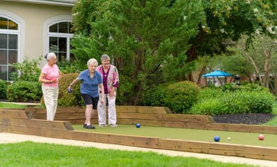Residents enjoying outdoor bocce ball