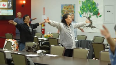 Residents participating in an exercise activity in a common area