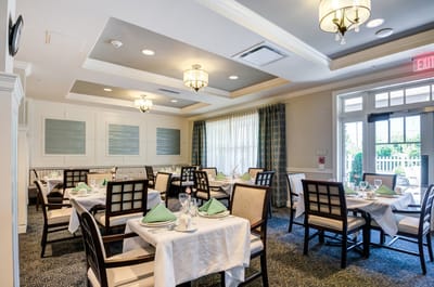 Elegant dining room with neatly set tables