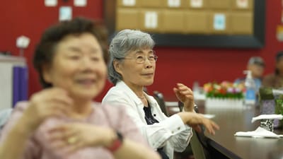 Residents enjoying a group activity in a common area