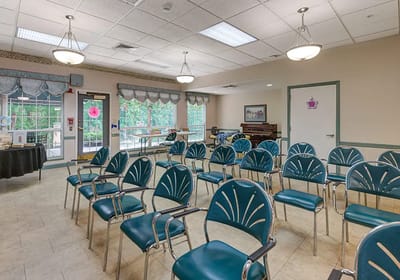 Interior view of a common area with empty chairs