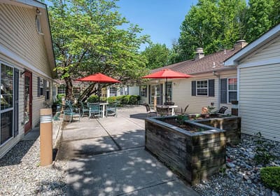 Outdoor courtyard with seating and shaded areas