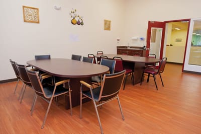 Interior dining area with a large table and chairs
