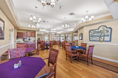 Dining area with tables and chairs in a restaurant setting