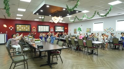 Residents engaging in activity in a dining room
