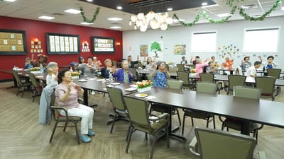 Residents participating in an activity in the dining room