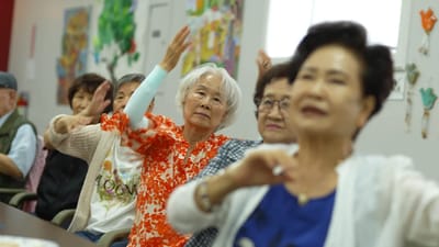 Residents participating in an indoor activity session