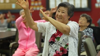 Residents enjoying a group activity in a recreational room