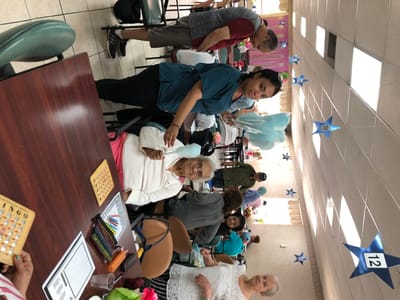 Residents enjoying an activity with cotton candy
