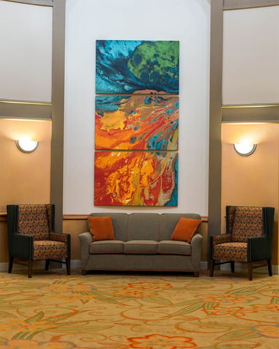 Interior seating area with colorful artwork