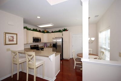 A bright kitchen area with dining space