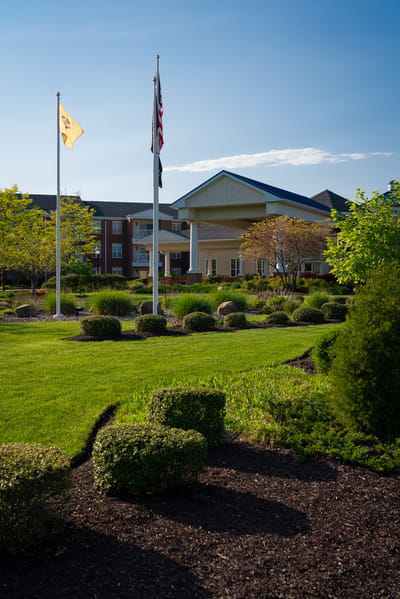 View of the facility building with landscaped grounds
