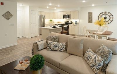 Cozy living room area of a senior living apartment