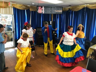 Residents participating in a lively cultural performance