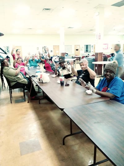 Residents engaging in a group activity in a common area