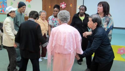 Residents participating in a lively group activity.