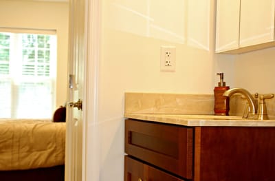 Interior view of a resident room with a bathroom sink