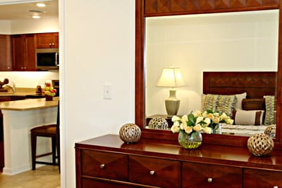 Brightly lit interior of a resident room with decorative elements