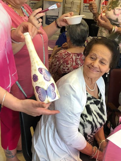 Residents participating in an arts and crafts activity