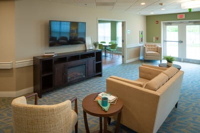 Cozy common area with seating and a television