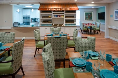 Dining area set with colorful tableware and decorations