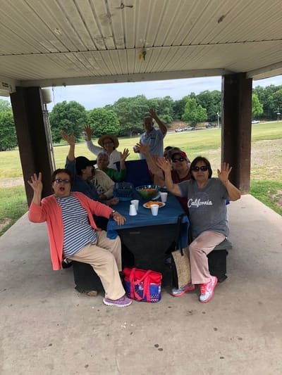 Residents enjoying a cheerful gathering outdoors