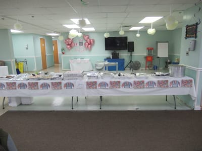 Dining setup with food and decorations during an event