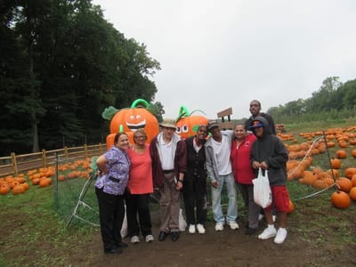Residents enjoying a pumpkin patch outing