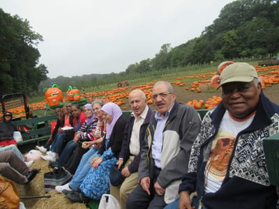 Residents enjoying a pumpkin patch outing