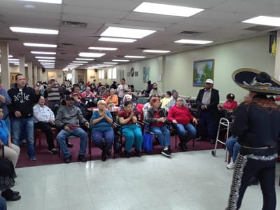 Residents enjoying an entertainment event in a common area
