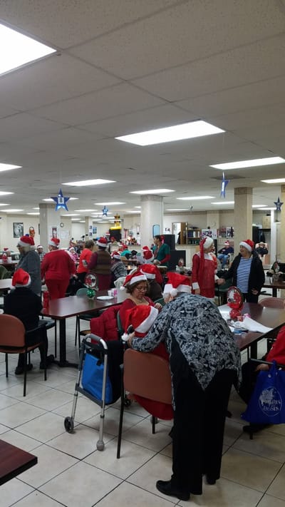 Residents celebrating in a festive common area