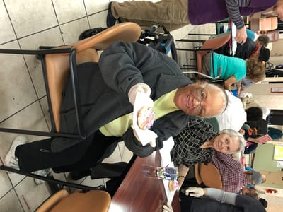 Residents enjoying a dessert activity in a common area